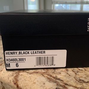 Nice black wedge sandals, open toed shoes. Great for work and look professional.